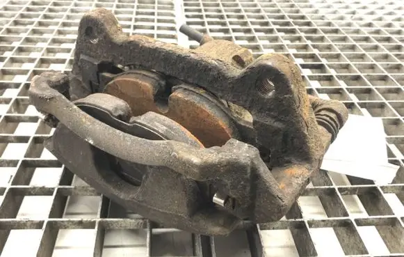 Volkswagen Golf VII Front brake caliper 