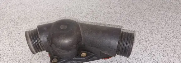 Thermostat/thermostat housing