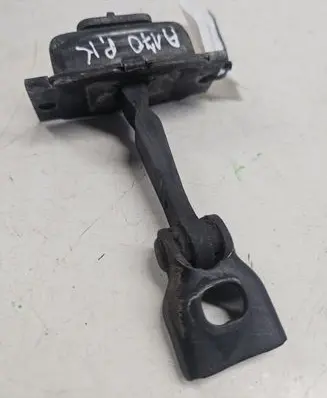 Front door check strap stopper