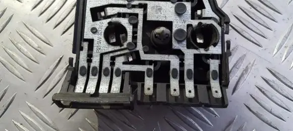 Tail light bulb cover holder
