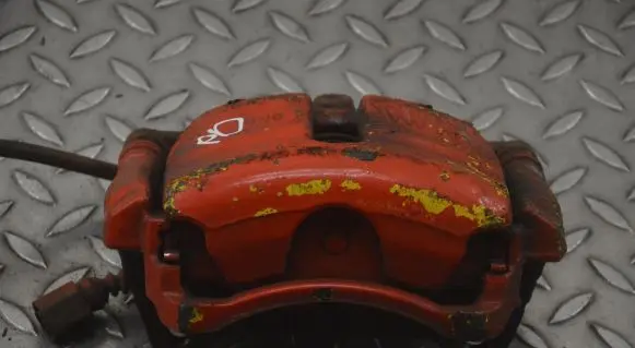 Volkswagen Golf VII Front brake caliper