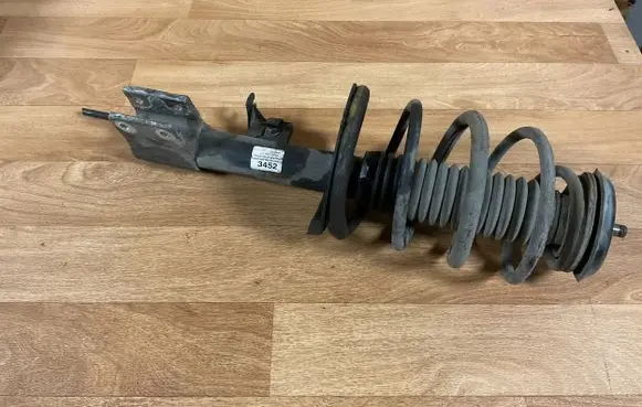 Citroen C4 I Front shock absorber with coil spring 3452