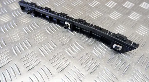 Rear bumper mounting bracket