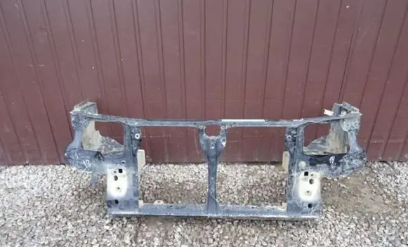 Radiator support slam panel
