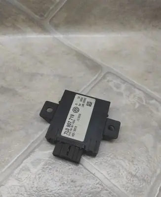 Volkswagen Touareg I Alarm control unit/module 7L0907719