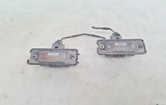 Volkswagen Golf IV Number plate light 1J6943021