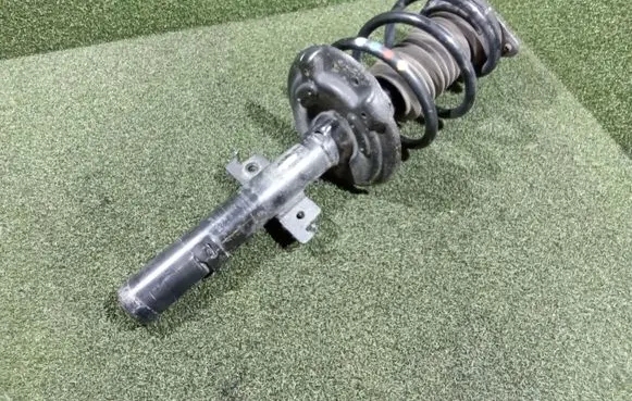 Renault Espace V (RFC) Front shock absorber/damper 543027894R