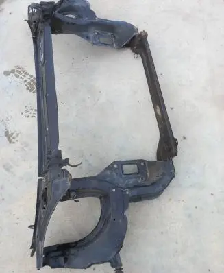 Radiator support slam panel