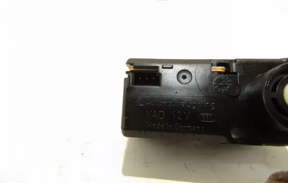Volkswagen Touran I Headlight level adjustment motor 