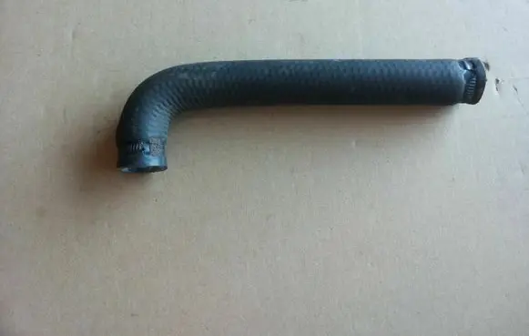 Volkswagen Golf I Engine coolant pipe/hose 056121053B