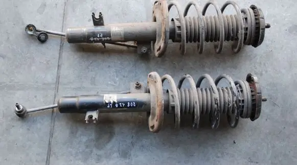 Peugeot 208 Front shock absorber with coil spring