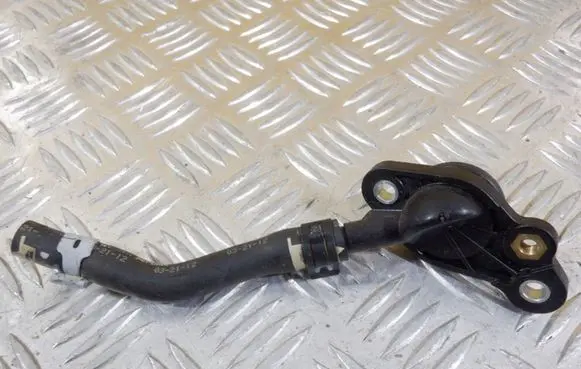 Volkswagen Golf VII Engine coolant pipe/hose 06K121049A