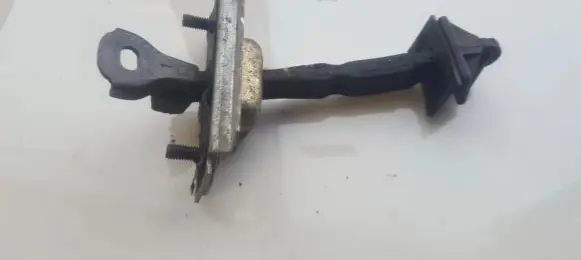 Mazda Premacy Rear door check strap stopper