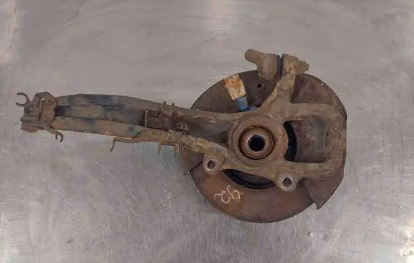 Volkswagen Touareg I Front wheel hub spindle knuckle 7L6407258A 7774