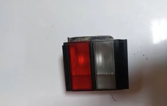 Volkswagen PASSAT B3 Tail light bulb cover holder 321945259