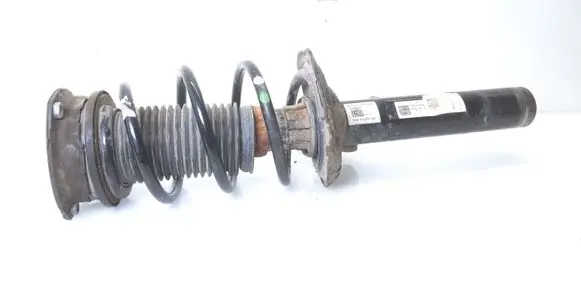 Volkswagen Golf VII Front shock absorber with coil spring 5Q0412037QH 5Q0413031GG