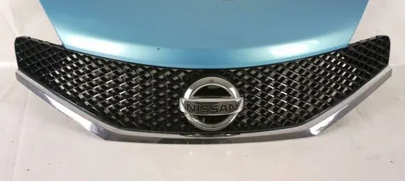 Nissan Note (E12) Front bumper upper radiator grill 623103VU0A