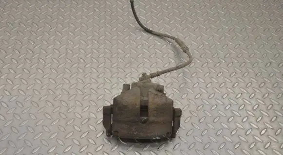 Volkswagen PASSAT B7 Front brake caliper