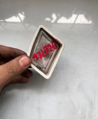 Trunk door license plate light bar