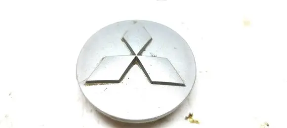 Mitsubishi Pajero Original wheel cap MR554097 MN101604