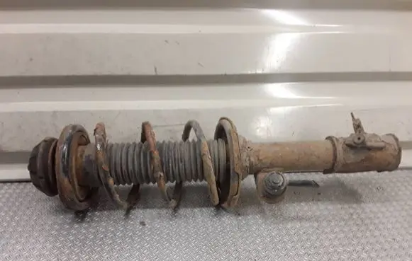Nissan Pixo Front shock absorber with coil spring 
