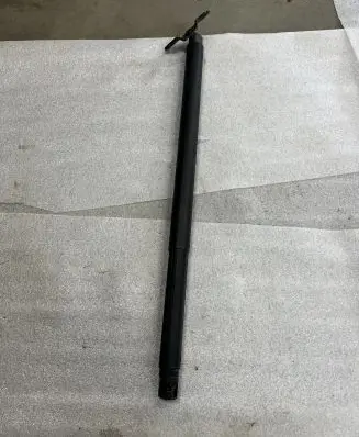 Cadillac Escalade Tailgate/trunk strut/damper 23487668