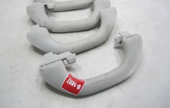 Volkswagen Golf VI A set of handles for the ceiling 1K0857607M
