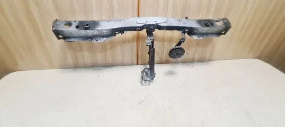 Top upper radiator support slam panel
