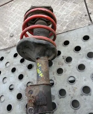 Ford Escort Front shock absorber with coil spring