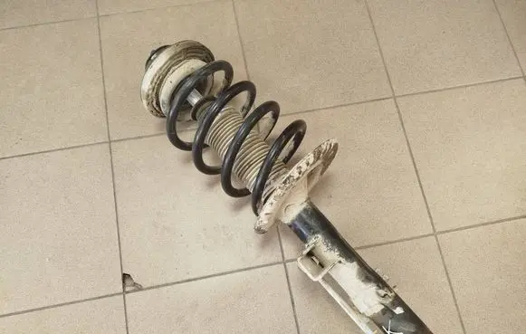 Volkswagen Transporter - Caravelle T5 Front shock absorber with coil spring 7H0413031