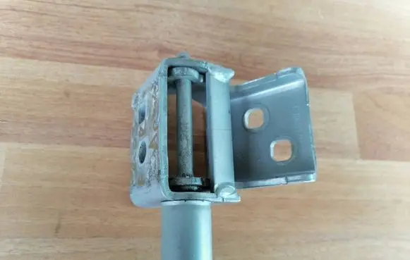 Front door lower hinge