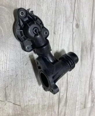 Thermostat/thermostat housing