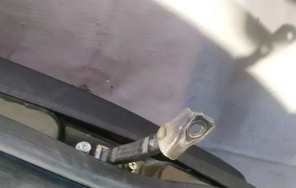 Mitsubishi Lancer X Rear door check strap stopper