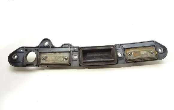 Volkswagen Jetta V Trunk door license plate light bar 1T0827574B