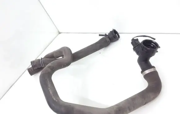 Volkswagen Golf VII Engine coolant pipe/hose 5Q0121049R