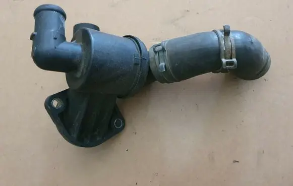 Volkswagen Amarok Engine coolant pipe/hose 03L121111AB