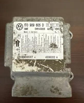 Volkswagen Touran I Airbag control unit/module 1T0909605D 5WK43828 02H021S0100