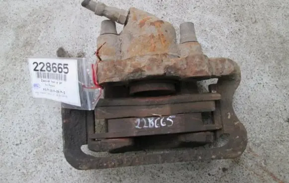 Volkswagen PASSAT B2 Front brake caliper