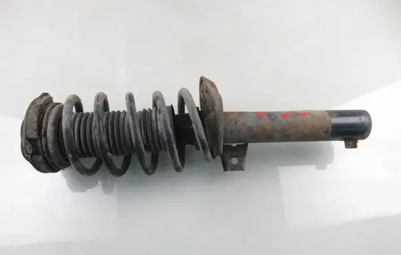 Volkswagen Caddy Front shock absorber with coil spring 1T0413031GB