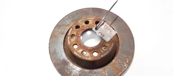 Volkswagen PASSAT B6 Rear brake disc neventiliuojamas