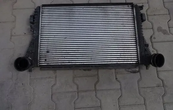 Volkswagen Golf V Intercooler radiator 1K0145803L