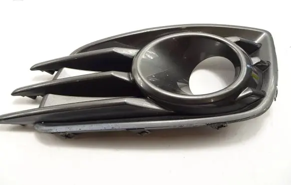 Suzuki Swift II Front fog light trim/grill 7179170L