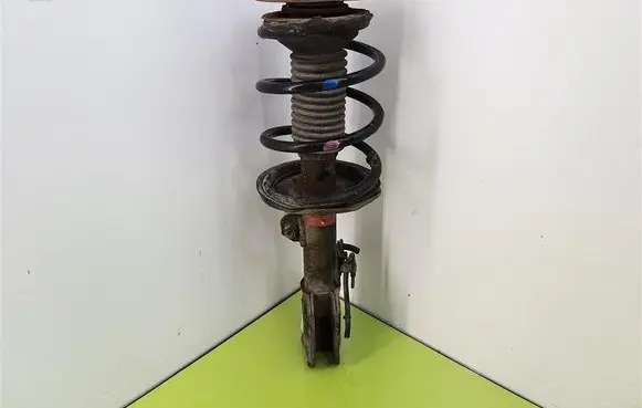 Toyota Avensis T250 Front shock absorber with coil spring 