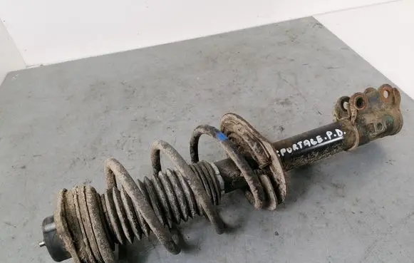 KIA Sportage Front shock absorber with coil spring 546603U000
