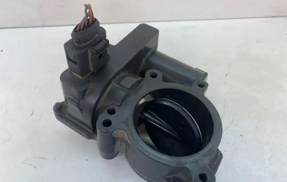 Volkswagen Touran I Throttle valve 03C128063A A2C53104475 180607120845