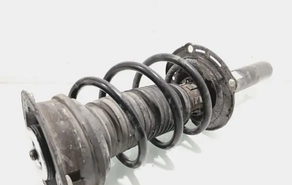 Volkswagen Golf VII Front shock absorber with coil spring 5Q0413023FJ