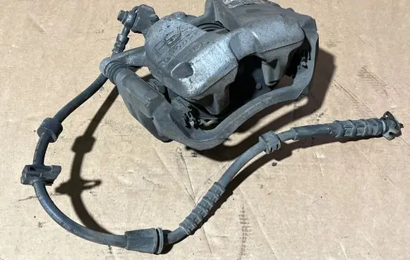 Peugeot 5008 II Front brake caliper 1623162180