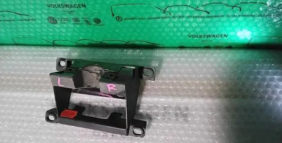 Volkswagen Touareg I Headlight washer nozzle holder 7L6807362