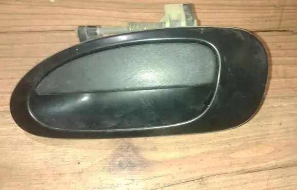 Mazda 323 Front door exterior handle