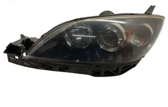 Headlight/headlamp mounting bracket
